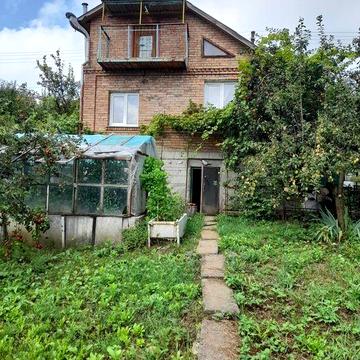 Цегляний будинок у Видрових Долах