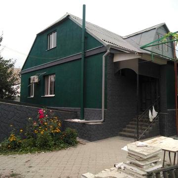 Будинок в центрі міста з бетонним укриттям