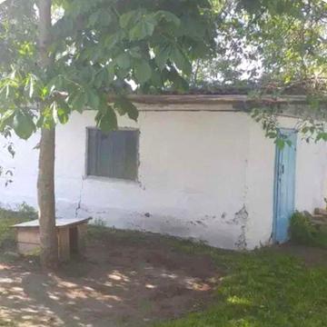 Будинок в селі Гута.