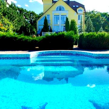 Підлісна, 77