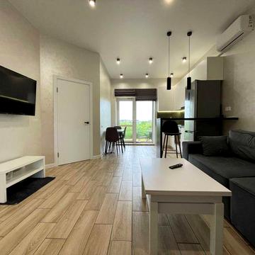 Здам 1-спальневу квартиру в новобудові з власною ділянкою