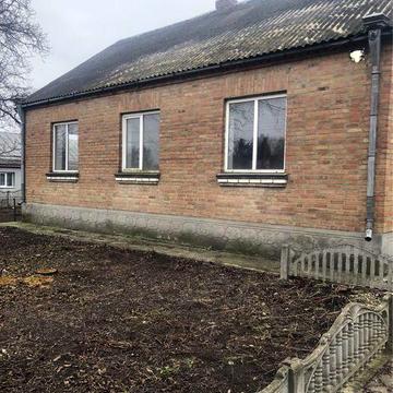 Продаж цегляного будинку