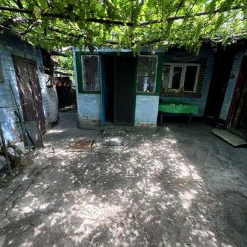 Продам частину будинку біля базару 7000