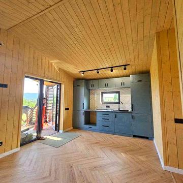 Каркасний будинок 70 м2 з трьома кімнатами та терасою під ключ