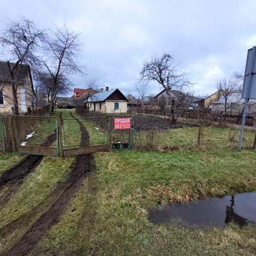 Деревяний будинок та земельна ділянка 14 сот. м. Камянка-Бузька