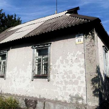 Продам 1/2 будинка