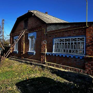 Будинок з садом та городом
