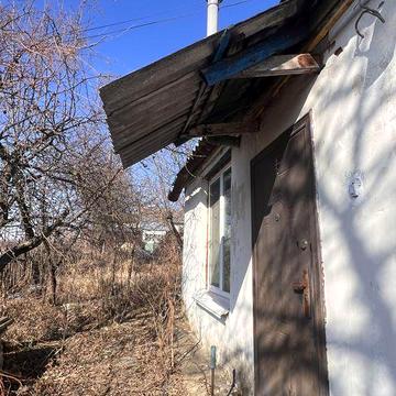 Продається камʼяний будинок з ділянкою,гаражем і садом