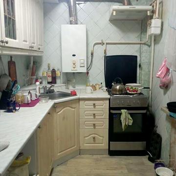 Продаю 4-х комнатную квартиру в центре