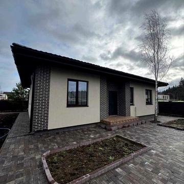 Новий будинок біля лісу в закритому котеджному містечку