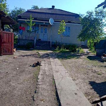 Будинок + земельна ділянка