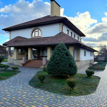 Премиальный дом с сауной, террасой и гаражом на 2 авто в Куриловке