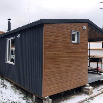 Модульний будинок з каміном.