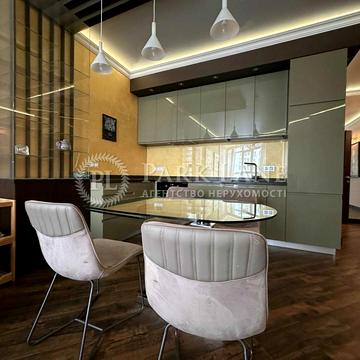 Євгена Коновальця вул. (Щорса), 44-А