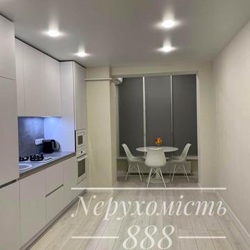 Героїв Небесної Сотні просп., 16/28