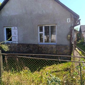 Ділянка з будинком