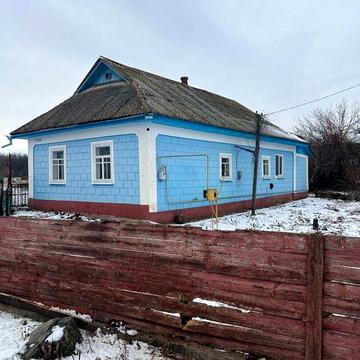 Будинок на березі річки Південний Буг