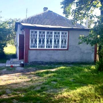 Продам 1/3 частку будинку з земельною ділянкою  с. Путрівка,