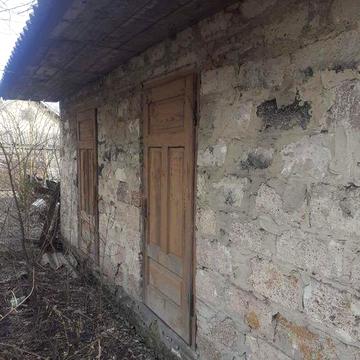 Продам земельну ділянку з будинком