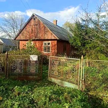 Будинок з ділянкою в с. Бучали