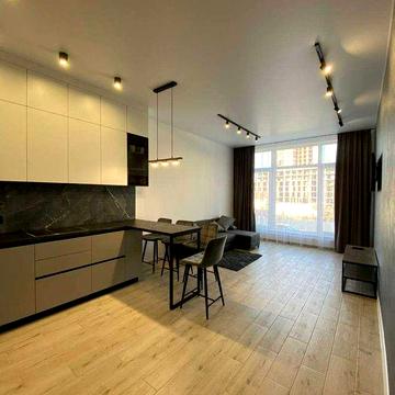 Продаж квартири в новобудові кухня-студіо і спальня