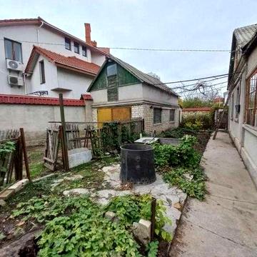 Продам! Полдома на Таирова с участком на улице Новгородская