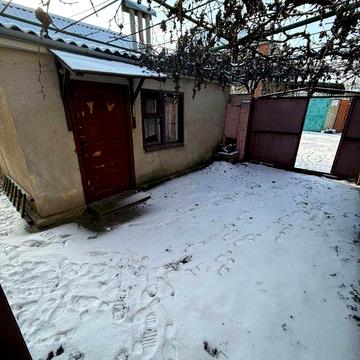 Продам часть дома в пос. Дзержинского. Малиновский р-н.(217-981)