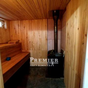 Будинок з гаражем, баня та ділянкою 7 соток. Сухий лиман