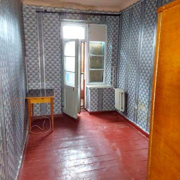 Продам 1-кімнатну гостинку з балконом вул.Миру,14 ХТХ житловий стан С