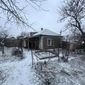 Продам пів будинку р-н. Базару