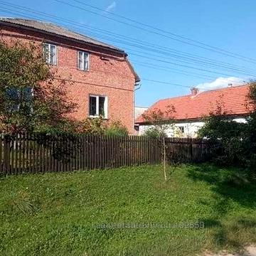 Продаж житлового будинка та земельної ділянки