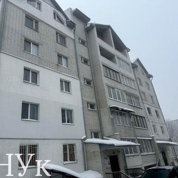 Трикімнатна квартира з мансардою у цегляному будинку