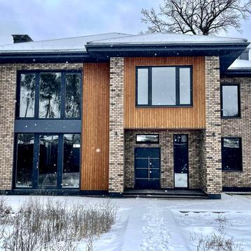 Останній будинок неподалік парку у лісовій Бучі