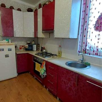 Продам 1/2 частину будинку з гаражем