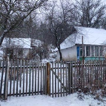 Хата з надвірними спорудами на земельній ділянці 0,15га.