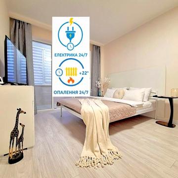 Белоснежная кроватка. Сеть Alex Apartments.