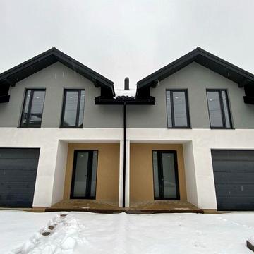Сучасний дуплекс 130 м² з гаражем і 3 сотками землі біля міста