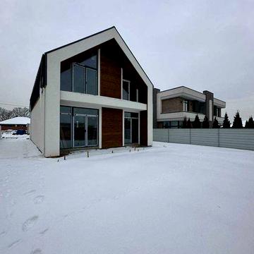 Сучасний будинок в Бучі двоповерховий