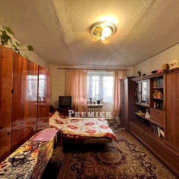 Продается 1-комнатная квартира  в хорошем районе за Киевским рынком.