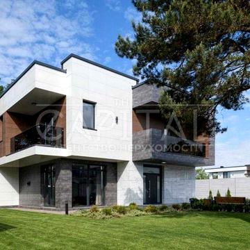 Сучасний будинок на березі Дніпра у новому River Island (Київ)