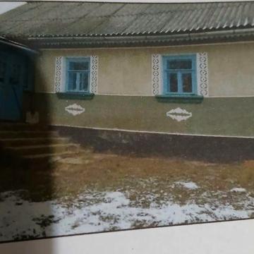 Будинок  +земельна ділянка