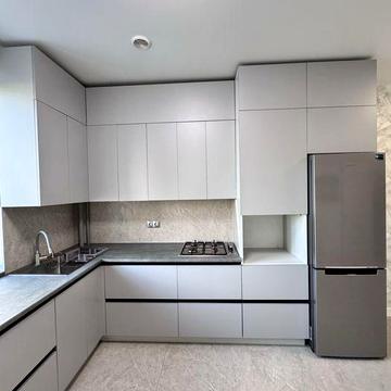 Агора, забудовник Комунбуд