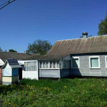 Будинок у Звягелі | 2 гаражі, 8 соток, електро + пічне опалення