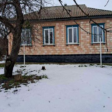 Будинок у центрі м.Корсунь-Шевченківський(біля центрального ринку)