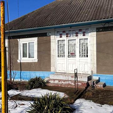 Будинок з господарством