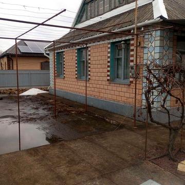 Цегляний будинок в місті Помічна