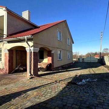 Продаж дому  з 15 сотими землі