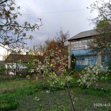 Продам 1/2 житлового будинку.