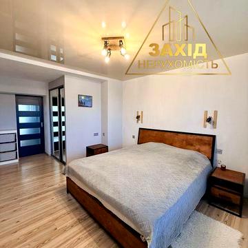 Простора 2 кімнатна з сучасним ремонтом