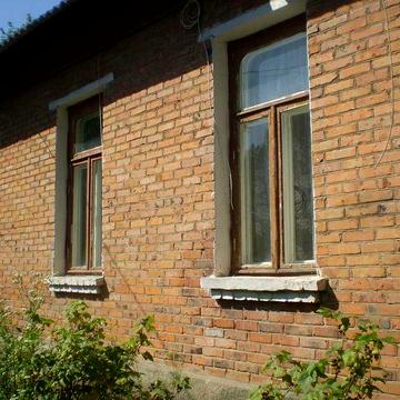 Екобудинок в центрі Житомира частина будинку 75 кв.м. прив. землі 4 с.